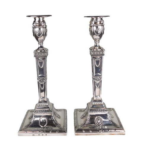 145 - British1777A pair of silver neoclassical Adams style candlesticksRobert Makepeace and Robin Carter, ... 