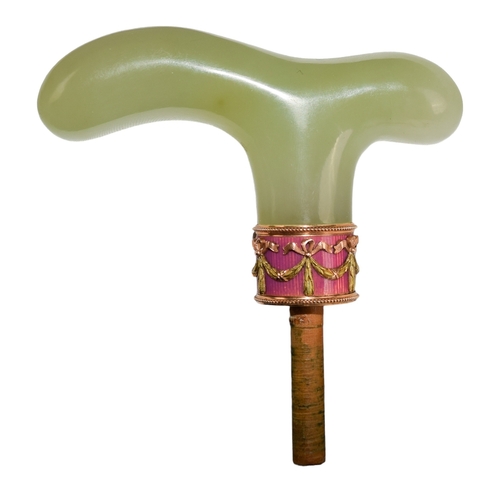 146 - FabergeImperial RussiaCirca 1900A two coloured gold and pink guilloche enamel bowenite cane handleWi... 