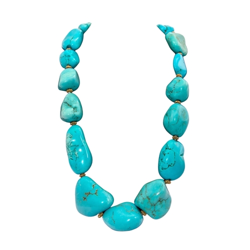 17 - BritishCirca 2000A fine large graduated turquoise matrix and gold bead necklaceTo a fluted gold clas... 