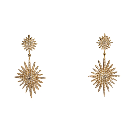 30 - BochicContemporaryA very attractive pair of 18 carat yellow gold and brilliant cut diamond star desi... 