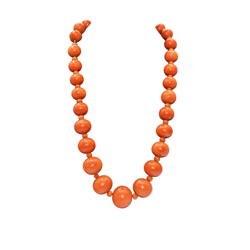 48 - ItalianCirca 1870A large graduated coral bead necklace, comprising 28 larger graduated coral beads, ... 