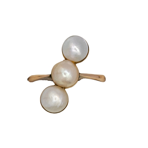 52 - ContinentalCirca 1900A three stone pearl and 14 carat rose coloured gold dress ringWeight: Approx. 2... 