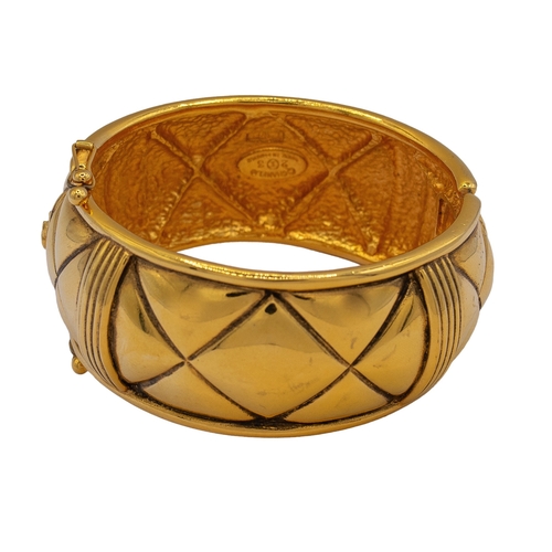 7 - Chanel Paris Circa 1970A fine gilt metal quilted cuff bangleSigned, 'Chanel made in France'In excell... 