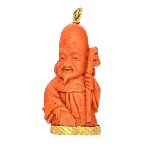 76 - Chinese/ItalianCirca 1960A coral and 18 carat gold pendantThe finely carved red coral depicting Shou... 