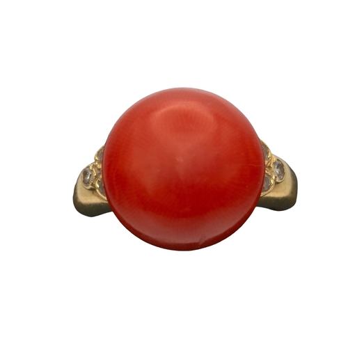 82 - ContinentalCirca 1970An 18 carat gold and buton shaped coral ringWeight: Approx. 7.35 gramsRing size... 