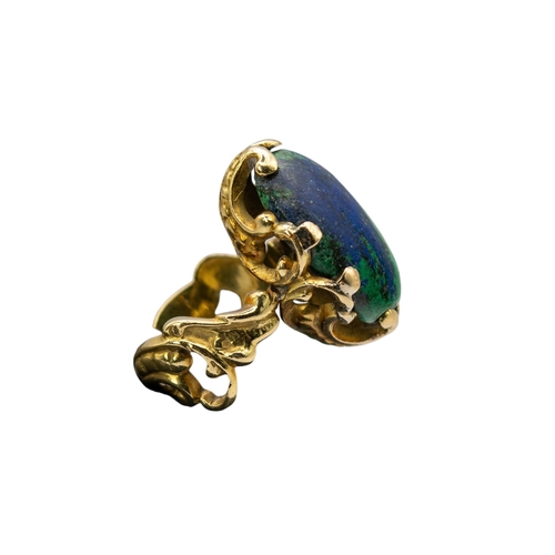 84 - ContinentalCirca 1970A Rococo style yellow metal and turquoise and lapis ringWeight: Approx. 15.63 g... 