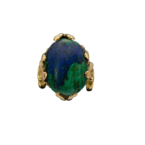 84 - ContinentalCirca 1970A Rococo style yellow metal and turquoise and lapis ringWeight: Approx. 15.63 g... 