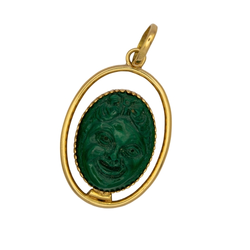 85 - ContinentalCirca 1970An 18 carat yellow gold and carved malachite laughing face pendantWeight: Appro... 