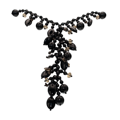 86 - ContinentalCirca 1980A black onyx and smoky quartz fancy necklace