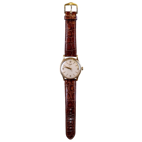 91 - Longines, SwissCirca 1950A 9 carat yellow gold wristwatch, with seconds sweep hand and gold numerals... 