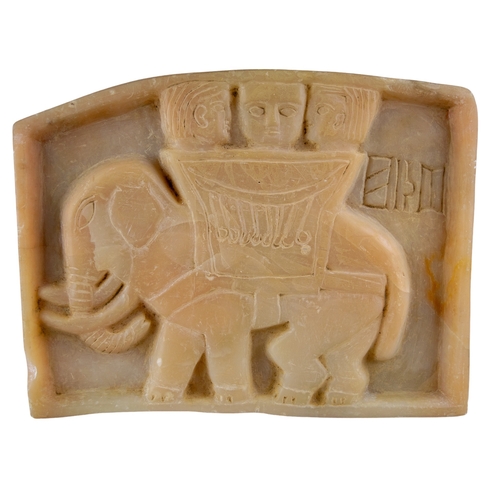 304 - South Arabian (?)An alabaster relief of an elephant carrying three people in a basket on its backTo ... 