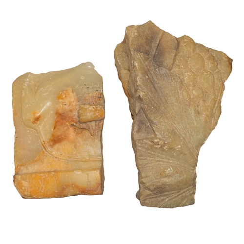 305 - South Arabian (?)Two alabaster relief fragments, one with vine leaf and grapes, another with an Anci... 