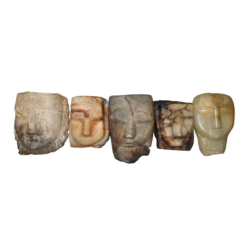 321 - South ArabianA Group of five stone carved heads, three with Ancient South Arabian inscriptionTo be s... 