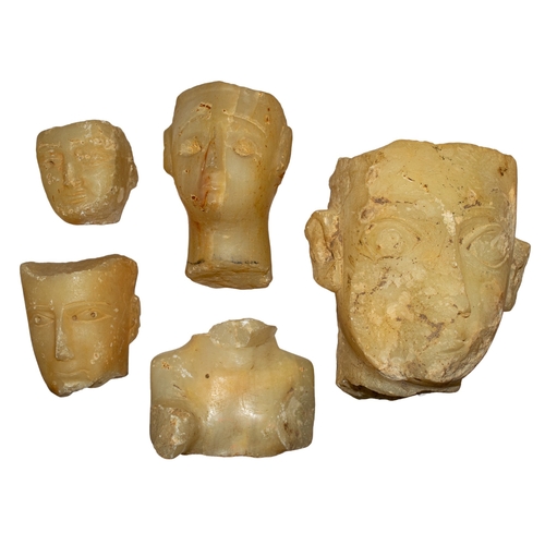 322 - South Arabian (?)A group of five alabaster fragments, including four heads and one torsoProvenance:P... 