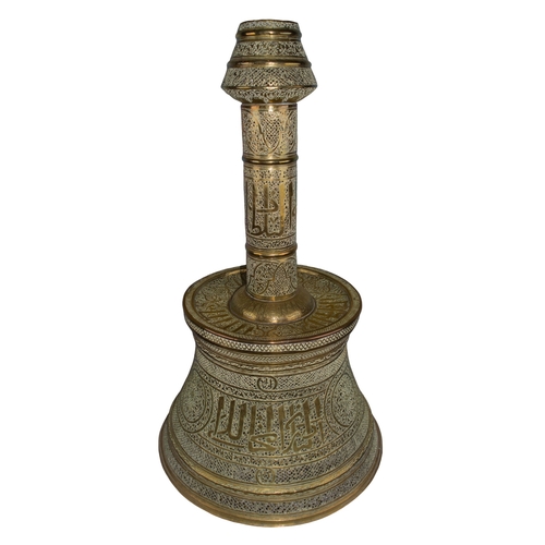 331 - SyrianLate 19th/Early 20th CenturyA large pierced and engraved candlestickDecorated with inscription... 