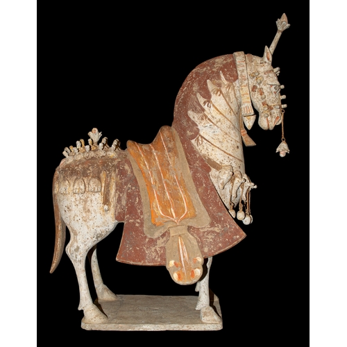 690 - Northern Qi Dynasty549-577 ADA very large Caparisoned HorseThe terracotta horse figurine on a rectan... 