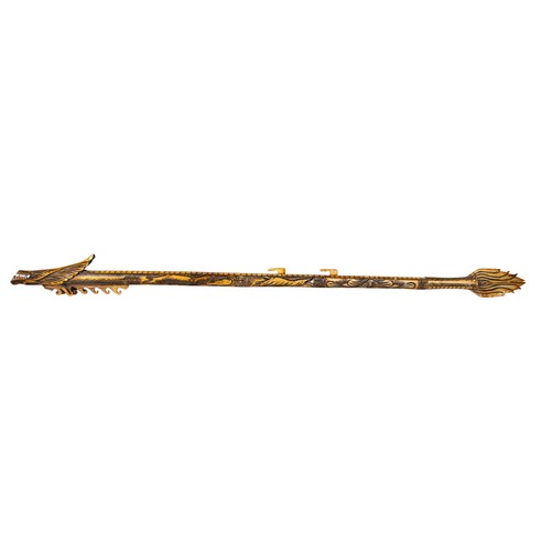 697 - South East AsianA carved bone blowpipeThe pipe formed as a stylised dragonDimensions:45 in. (L)... 