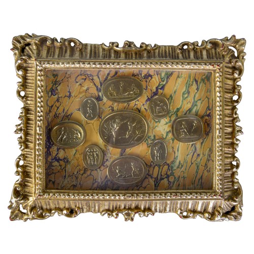 663A - 20th CenturyA pair plaque displays of nine gilt-metal intagliosTo be sold without reserveFrom the Dr... 