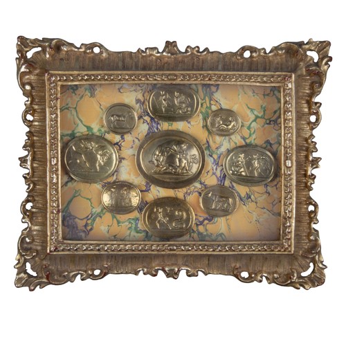 663A - 20th CenturyA pair plaque displays of nine gilt-metal intagliosTo be sold without reserveFrom the Dr... 