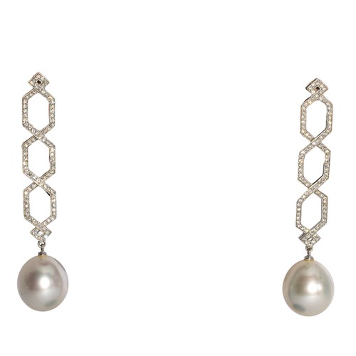 31 - AmericanContemporary Ivanka TrumpA fine pair of South Sea cultured pearl and diamond pendant earring... 