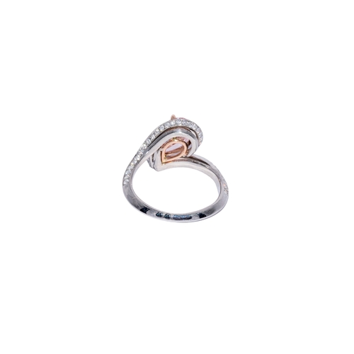 12 - EuropeanContemporaryA pretty, treated fancy intense orange pink diamond ringThe pear shaped modified... 