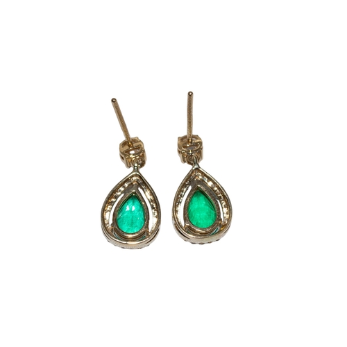 13 - EuropeanContemporaryAn attractive pair of Columbian emerald and diamond pendant earringsEach pear sh... 