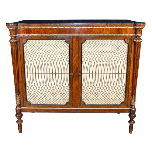 131 - BritishRegencyA rosewood chiffonierWith brass and silk lined front doors and decorative gilt carved ... 