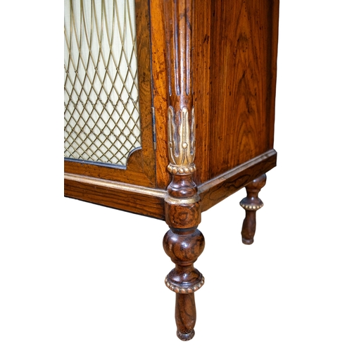 131 - BritishRegencyA rosewood chiffonierWith brass and silk lined front doors and decorative gilt carved ... 