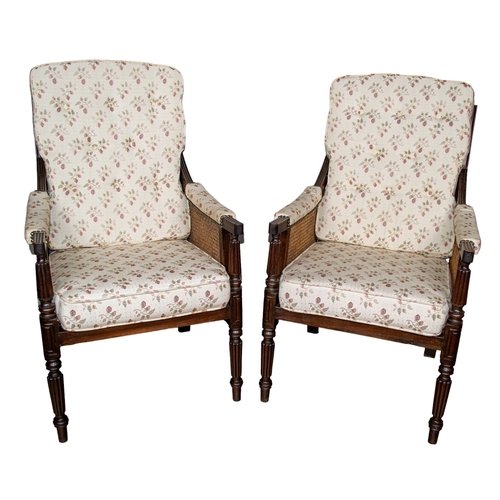 140 - Late 19th centuryA pair of Gainsborough armchairsMahogany, with fluted legs and caned seat Dime... 