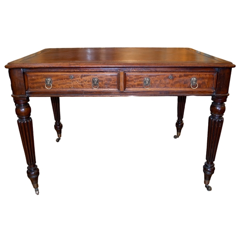 142 - EnglishRegency a table deskOak, with red leather gilt stamped top and fluted column legsProperty of ... 