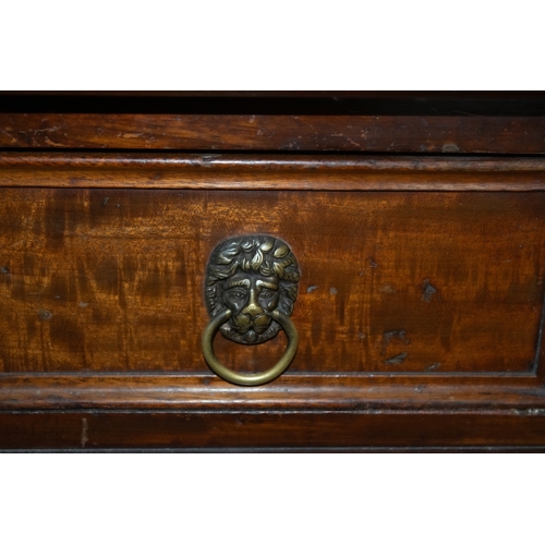 142 - EnglishRegency a table deskOak, with red leather gilt stamped top and fluted column legsProperty of ... 