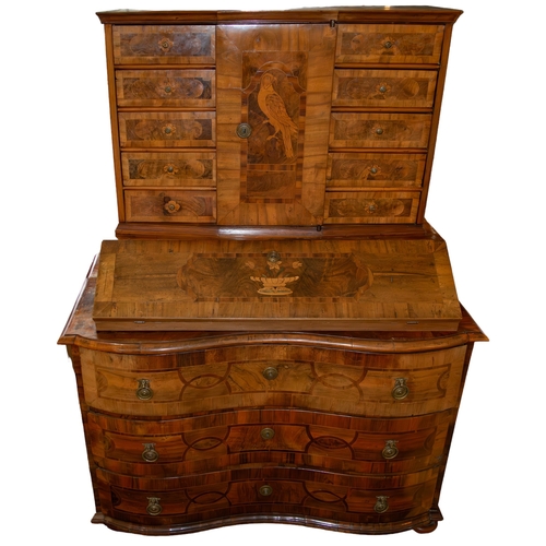 156 - German?18th CenturyAn inlaid walnut bureau cabinetDimensions:68 in. (H) x 50 in. (W) x 26.5 in. (D)... 