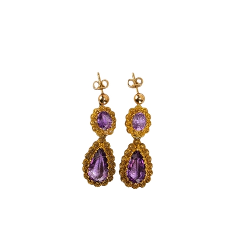 17 - BritishVictorianAn attractive amethyst and yellow gold collet necklaceComprising 22 oval shaped mixe... 