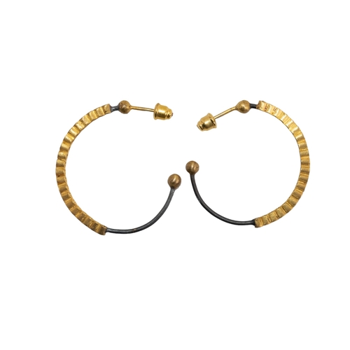 42 - BrooskiContemporaryA large pair of brilliant cut diamond Creole hoop earringsMounted in yellow ... 