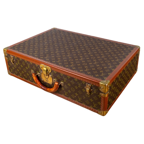 71 - Louis VuittonCirca 1980A monogram canvas 65L trunkWith brass fittings Dimensions: 7 in. (H... 