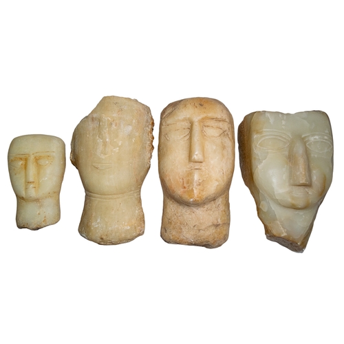 89 - South Arabian (?)A group of four alabaster headsProvenance:Private Collection of Dr. Mohammed Said F... 