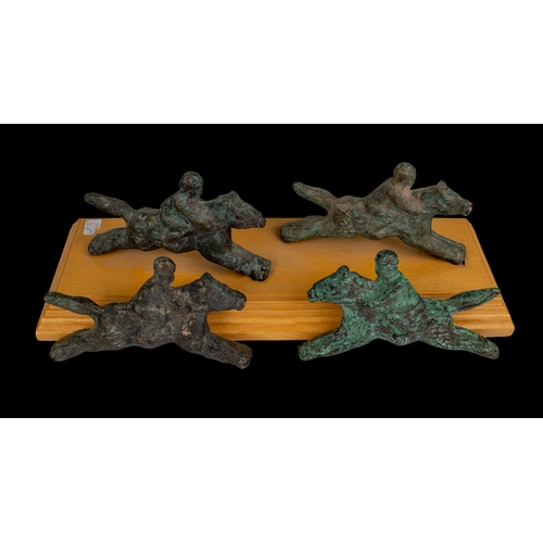 93 - Middle EasternA group of four bronze horses and ridersFrom the Dr Mohammed S Farsi CollectionDimensi... 