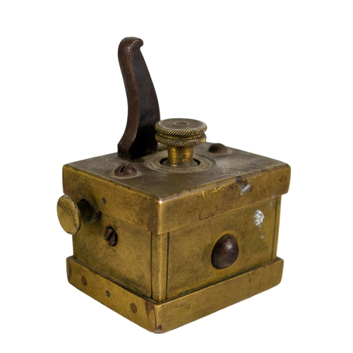 402 - BritishMid-19th CenturyAn antique brass scarificatorFrom the Gaia Servadio Collection... 