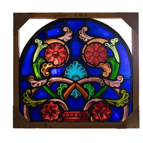 417 - VictorianA pair of stained glass windowsDecorated with gothic revival floral motifs With damage... 