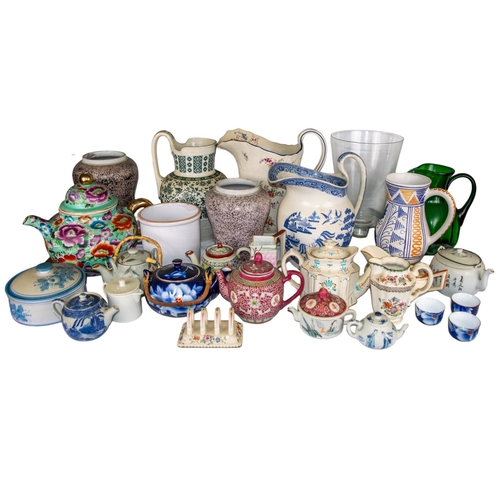 436 - 19th/20th CenturyA collection of ceramic, porcelain and glass itemsTo include:[a] Eleven teapots[b] ... 