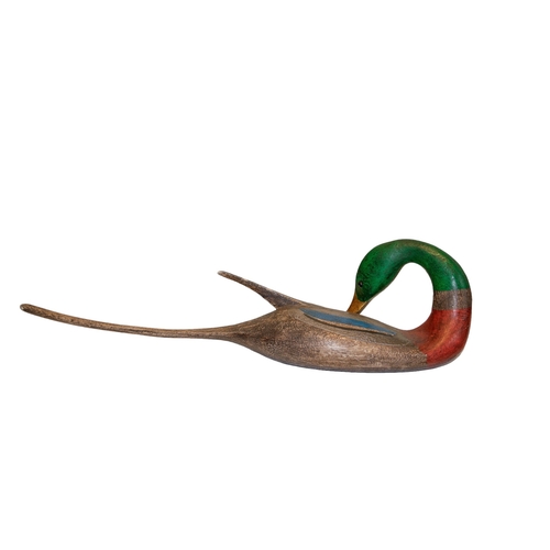 449 - Guy Taplin (b.1939)Preening Winged MallardSigned and inscribed as titled to the base,Painted carved ... 