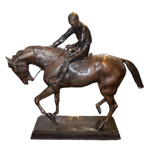 450 - 20th CenturyJockey and HorseBronzeDimensions:36 in. (H) x 41 in. (L) x 10.5 in. (W)... 