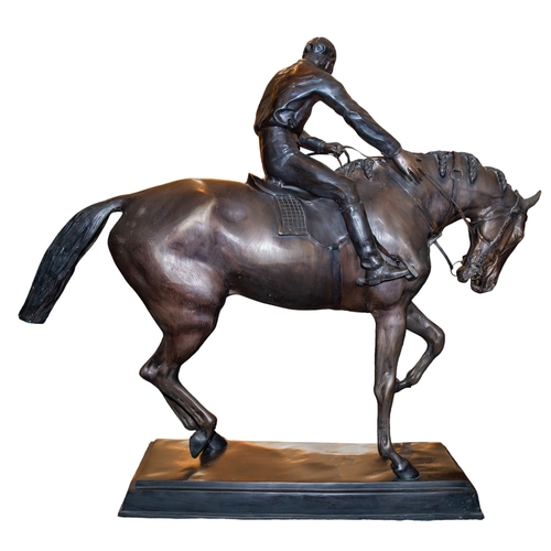 450 - 20th CenturyJockey and HorseBronzeDimensions:36 in. (H) x 41 in. (L) x 10.5 in. (W)... 