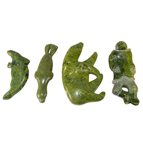 488 - CanadianInuit20th CenturyFour green soapstone carvingsTo include:A seal, broken and repairedAn intac... 