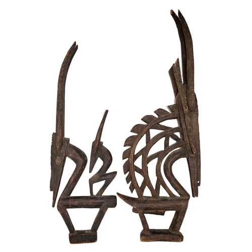 505 - AfricanAntiqueA pair of stylised carved animal headdressesDimensions:26.5 in. (H)... 