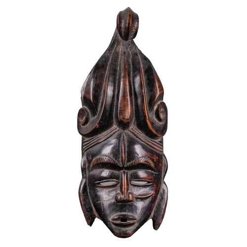 507 - West AfricanA carved wood maskTo be sold without reserveDimensions: 13 in. (H) x 5.5 in. (W)... 