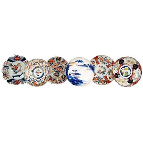 433A - 19th Century and earlier, JapaneseA collection of twelve Imari plates, including several pairs and s... 