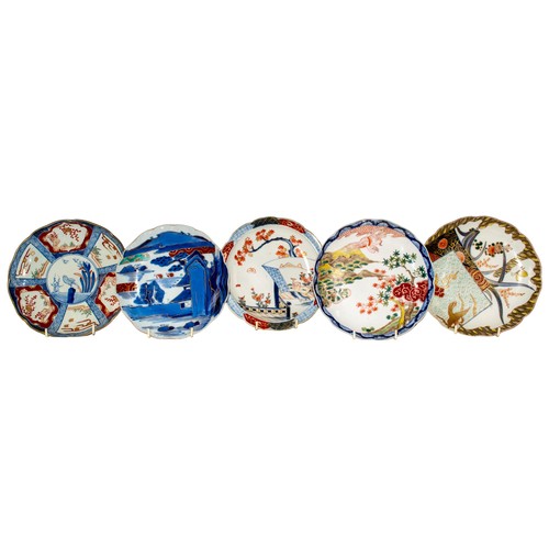 432A - 19th Century and earlier, JapaneseA collection of eleven Imari plates, including several with scallo... 