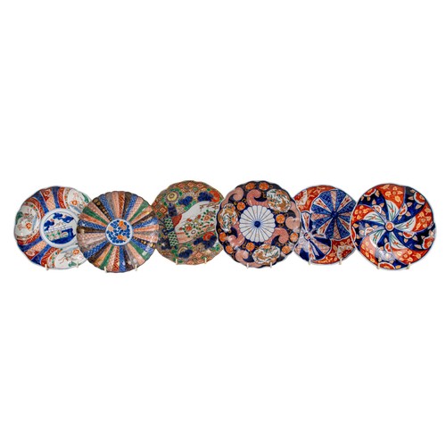 432A - 19th Century and earlier, JapaneseA collection of eleven Imari plates, including several with scallo... 