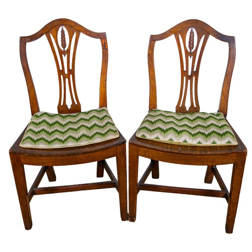 134A - British18th/19th CenturyA pair of mahogany shield back chairsDimensions: 37 in. (H) x 17 in. (W) x 1... 